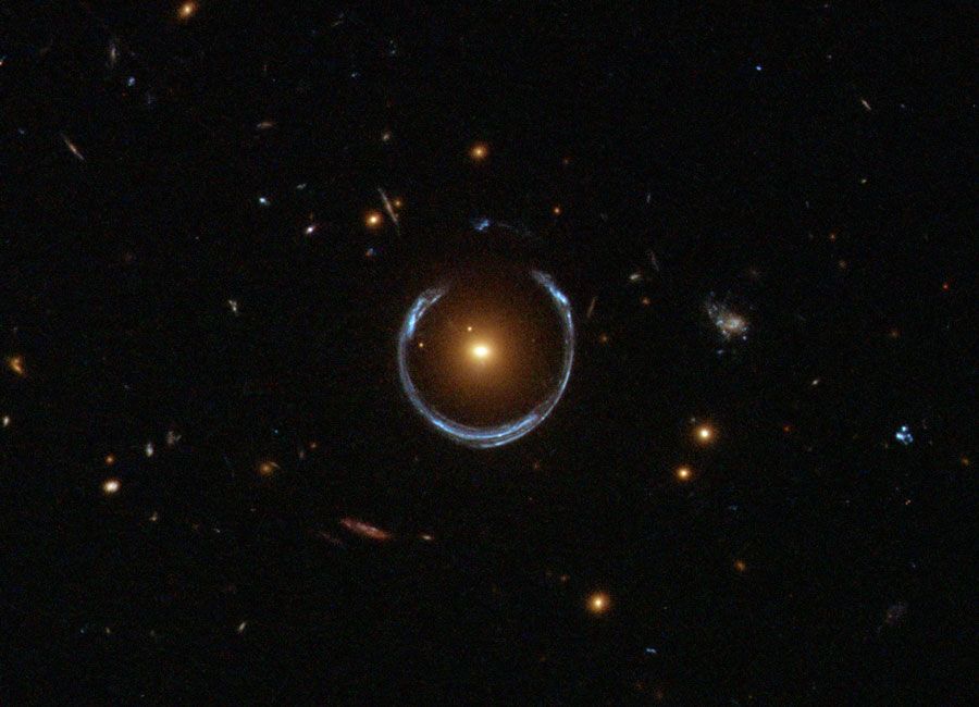 A Horseshoe Einstein Ring from Hubble