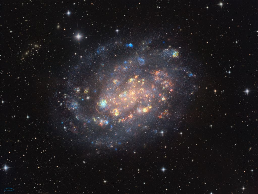 NGC 300: A Cosmic Gemstone with Stars and Gas Clouds